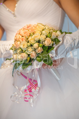 Bride holding wedding bouquet