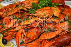 boiled crayfish with herbs and lemon