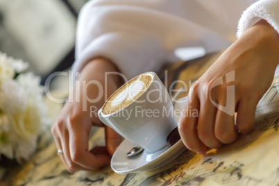 Bride drinking coffee