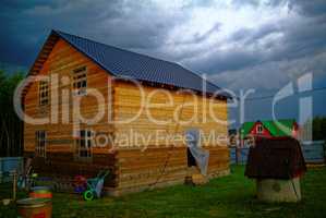wooden house for a rural plot in the spring