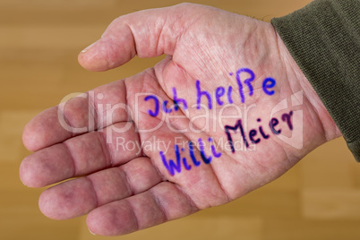 Hand with wrote down names