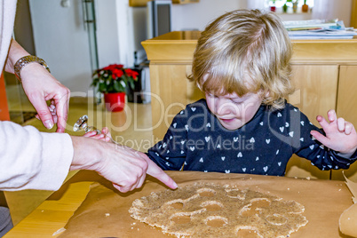 Child at the cookie baking