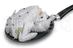 The chicken on the frying pan on a white background.
