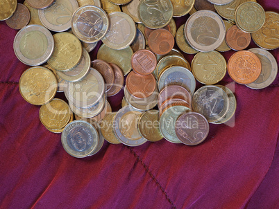 Euro coins, European Union over red velvet background