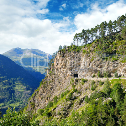 Mountains of Pyrenees, high-altitude road and tunnel.