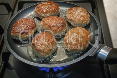 Cutlets pan fried in the fire.