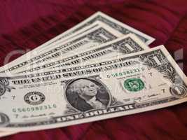 One Dollar notes, United States over red velvet background