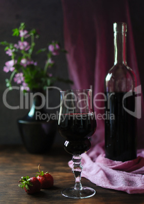 A refined drink is a glass of red wine.