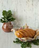 Still life with a loaf of bread.