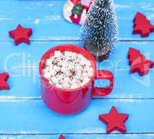 hot chocolate with marshmallow in a red  mug