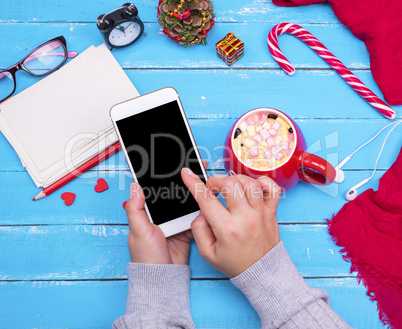 smartphone with an empty black screen in female hands