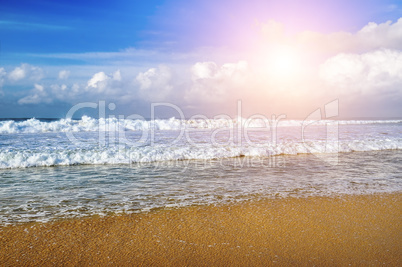 Beautiful seascape and sun on blue sky background.