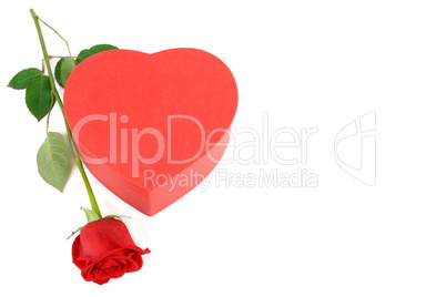 Gift box in the form of heart and scarlet rose isolated on white