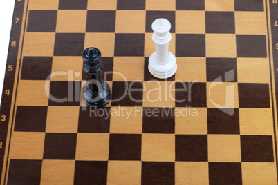 wooden checkerboard with figures