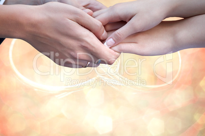 Wedding couple holding hands