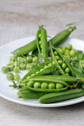 Pods of fresh green peas