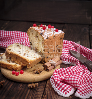 a bread cake with raisins and dried fruit