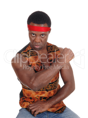 Serious looking African man in a vest