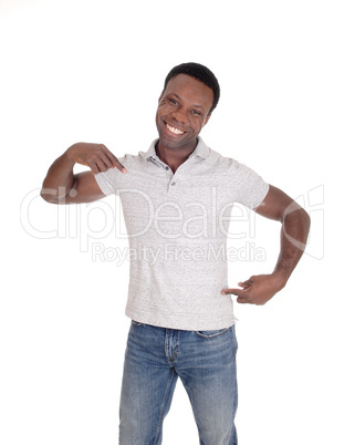 African man standing and pointing to himself