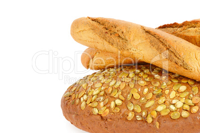 Baguette and bread with pumpkin seeds. Isolated on white backgro