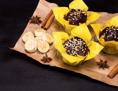 banana muffins wrapped in yellow paper