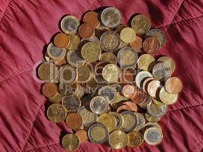 Euro coins, European Union over red velvet background