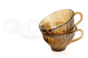 Empty tea cups isolated on white background.