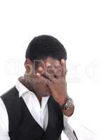 Black man covering his face