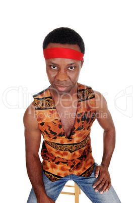 Serious looking African man in a vest
