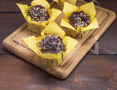 chocolate banana muffins sprinkled with walnut