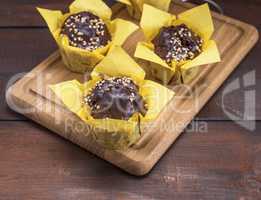 chocolate banana muffins sprinkled with walnut
