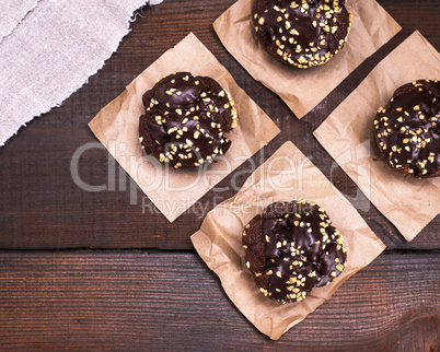 chocolate muffins are sprinkled with ground nut