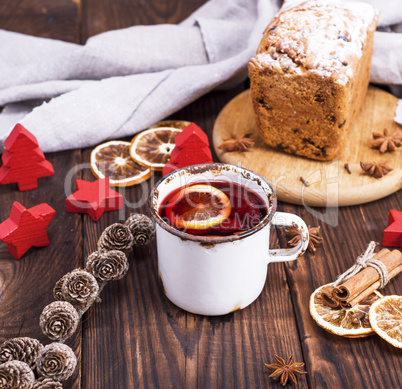 mulled wine in a white iron mug