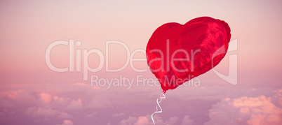 Composite image of red heart balloon