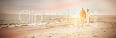 Senior couple walking on the beach