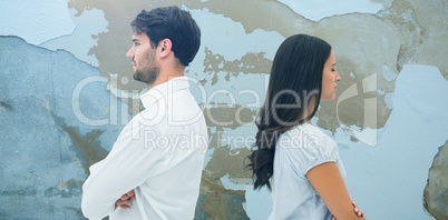 Composite image of upset couple not talking to each other after fight