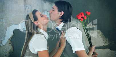 Composite image of geeky hipster holding roses and giving a kiss to his girlfriend