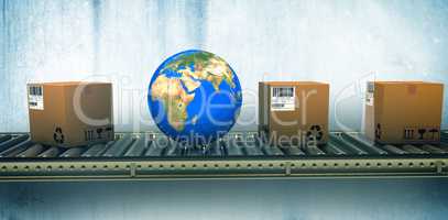 Composite image of blue globe and boxes on conveyor belt