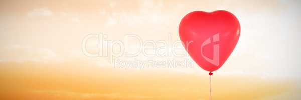 Composite image of valentines day heart balloon
