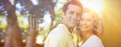 Happy couple standing on street