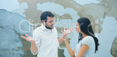 Composite image of angry brunette accusing her boyfriend
