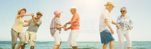Happy senior couples dancing
