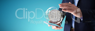 Composite image of businessman using mobile phone