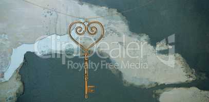 Composite image of gold heart key
