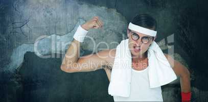Composite image of geeky hipster posing in sportswear