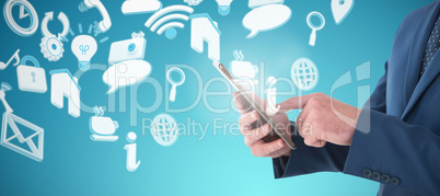Composite image of midsection of businessman using digital tablet