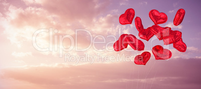 Composite image of heart balloons