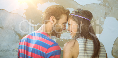 Composite image of happy young couple standing