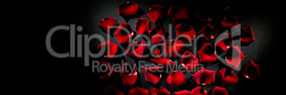 Scattered red rose petals