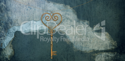 Composite image of gold heart key